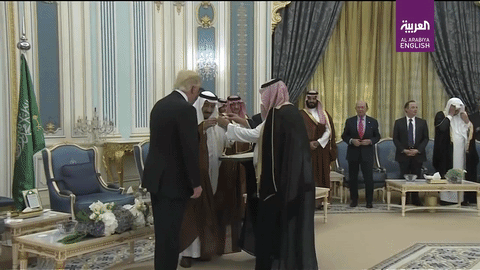 Trump_Curtsy_King-Saudi-Arabia_Medal.gif